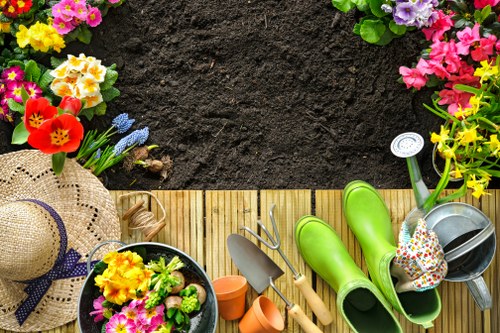 Local gardeners shaping a well-kept residential garden